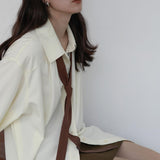 Ladies Wear A Slouchy Blouse Underneath